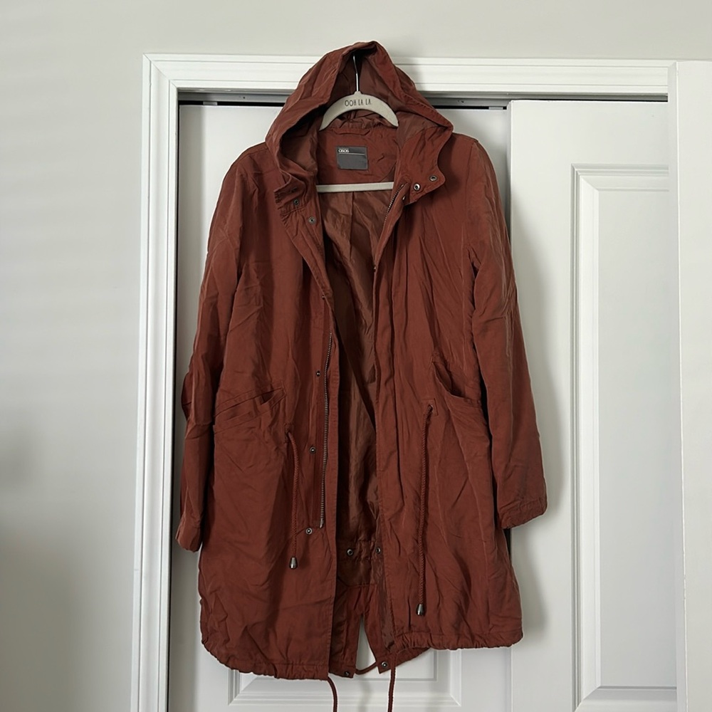 Lightweight, hooded knee length jacket
